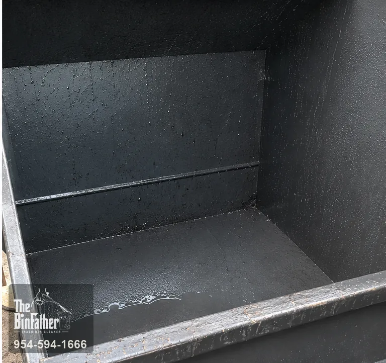 Inside a restaurant dumpster after a grease build-up, commercial dumpster cleaning in South Florida — after cleaning